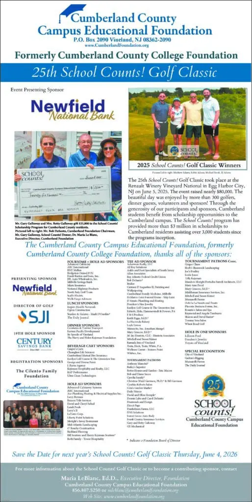 Community members present a large donation check at a fundraising event.